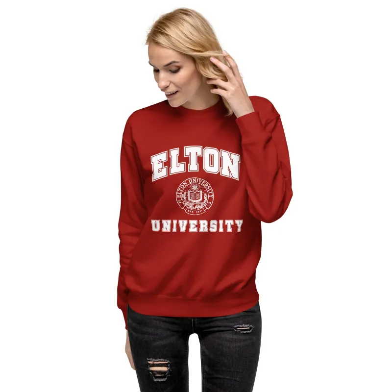 Woman wearing a red Elton University crewneck sweatshirt with the university seal