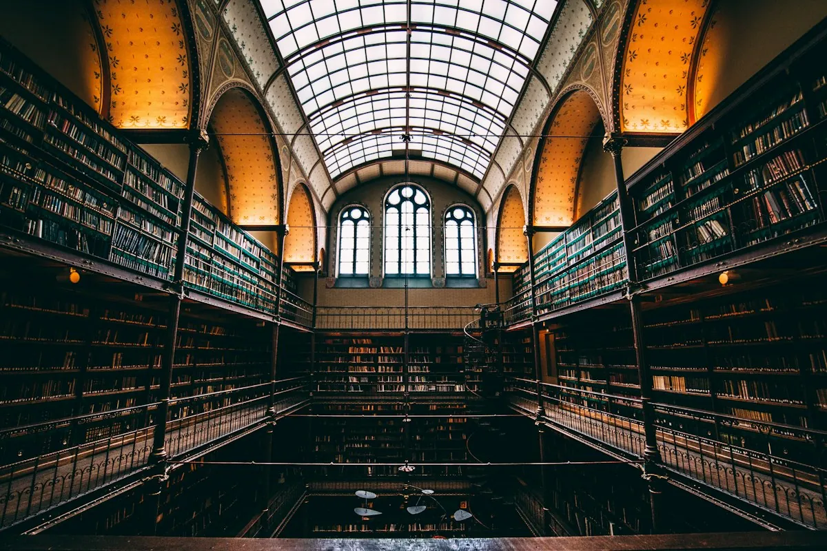 A grand library hall lined with bookshelves