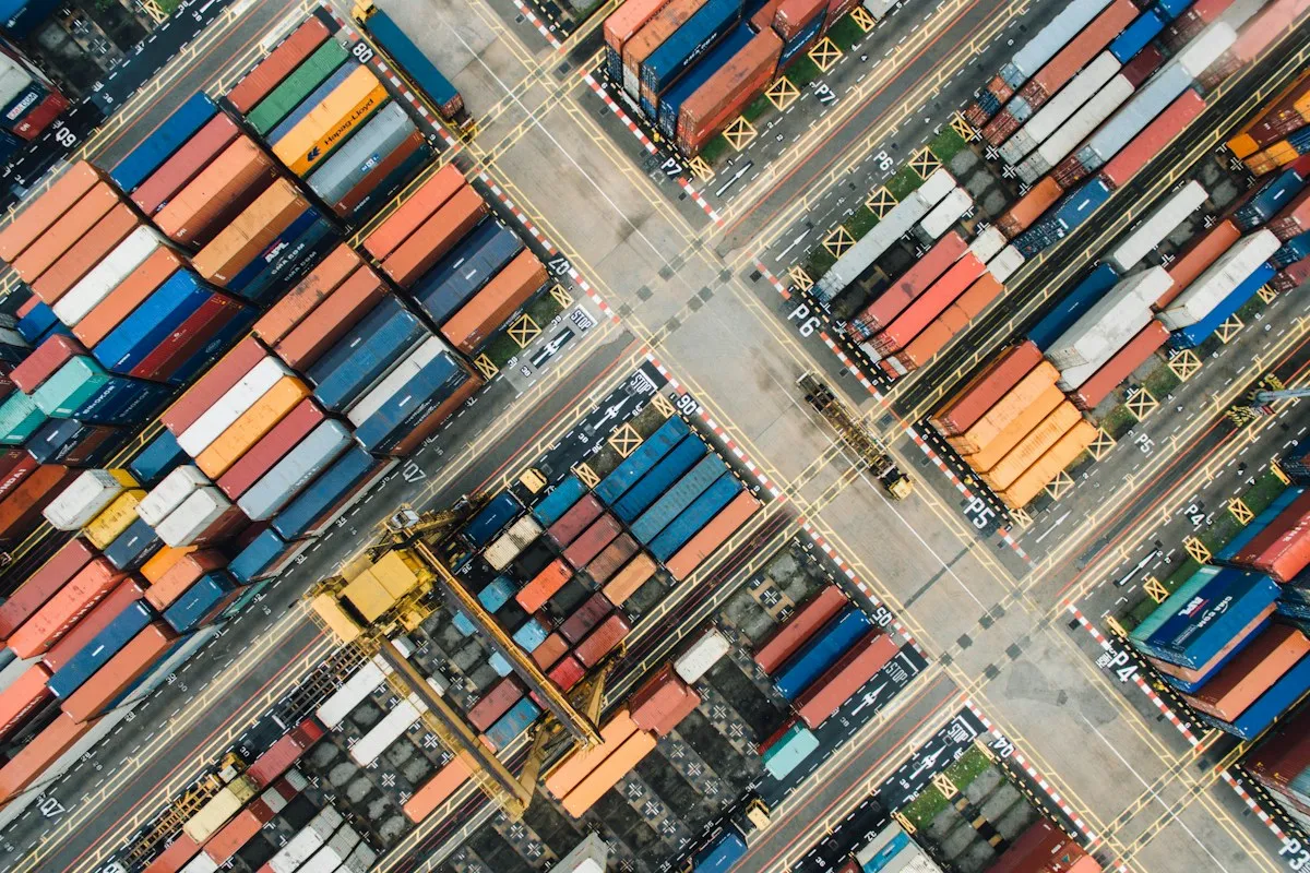 Aerial view of stacked shipping containers at a port
